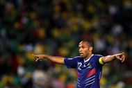 BLOEMFONTEIN, SOUTH AFRICA - JUNE 22:  Thierry Henry of France gestures to team mates during the 2010 FIFA World Cup South Africa Group A match between France and South Africa at the Free State Stadium on June 22, 2010 in Mangaung/Bloemfontein, South Africa.  (Photo by Clive Rose/Getty Images)